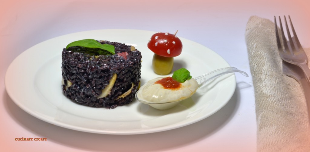 Tortino di riso venere e salsa al formagio